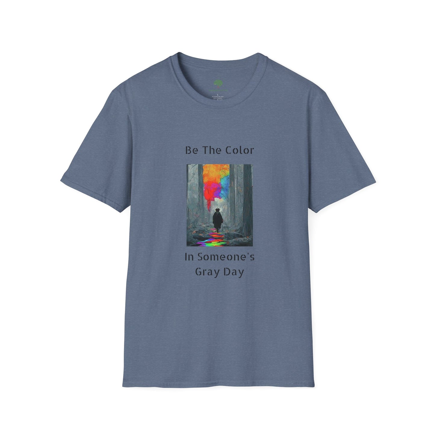 A graphic t-shirt featuring the vibrant, uplifting text 'Be The Color in Someone's Gray Day' centered on the chest, paired with colorful design accents.