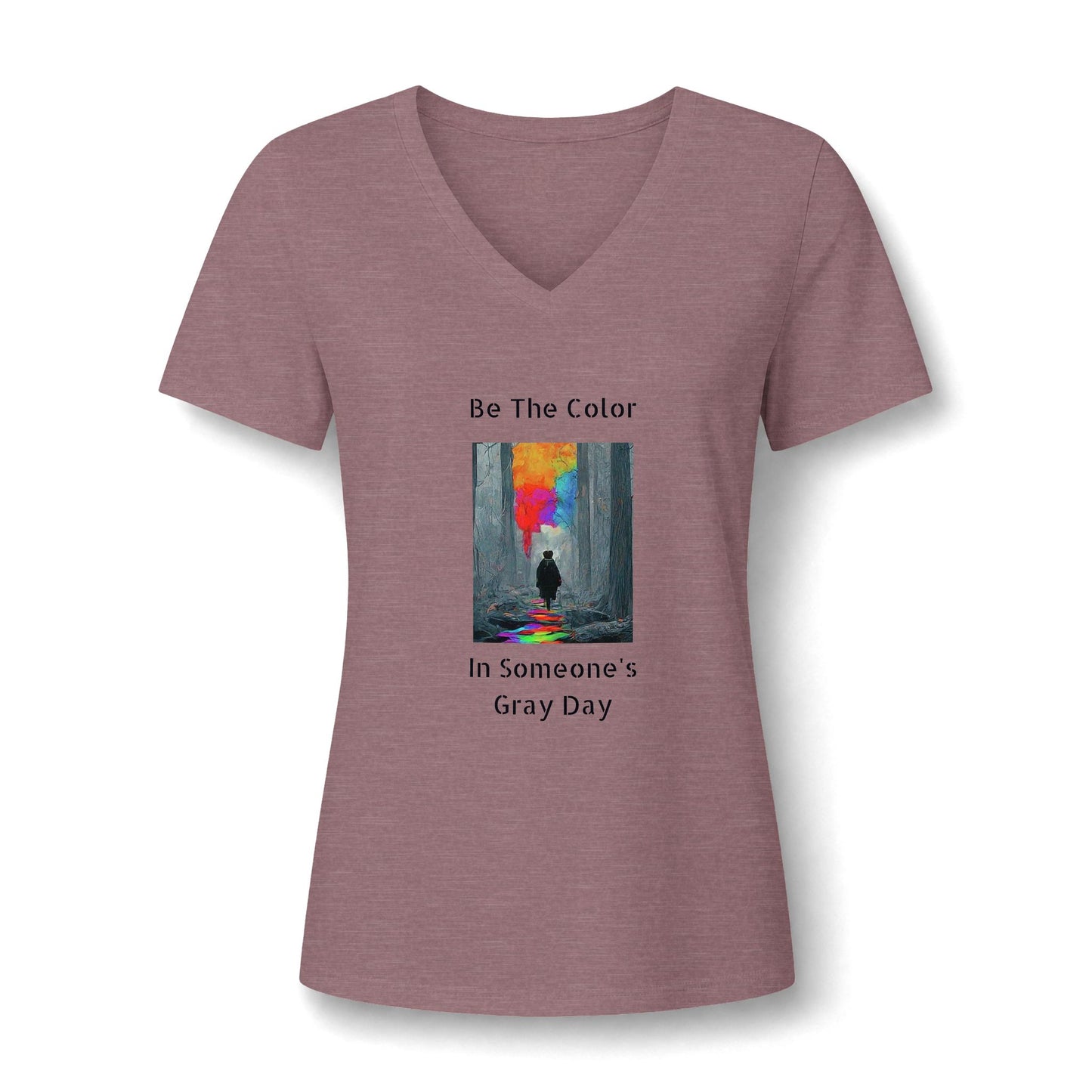 A graphic v neck featuring the vibrant, uplifting text 'Be The Color in Someone's Gray Day' centered on the chest, paired with colorful design accents in heather mauve