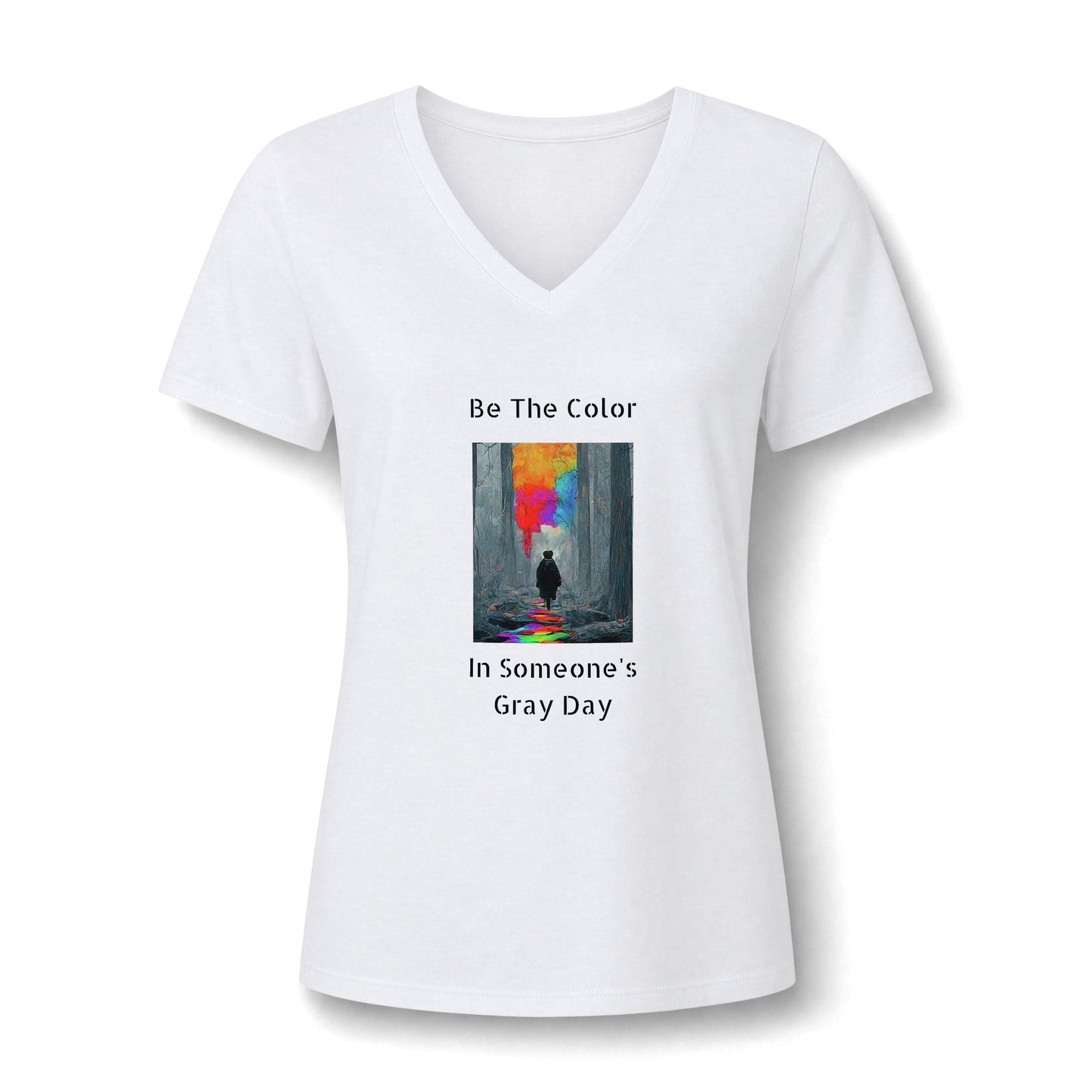 A graphic v neck  featuring the vibrant, uplifting text 'Be The Color in Someone's Gray Day' centered on the chest, paired with colorful design accents in white