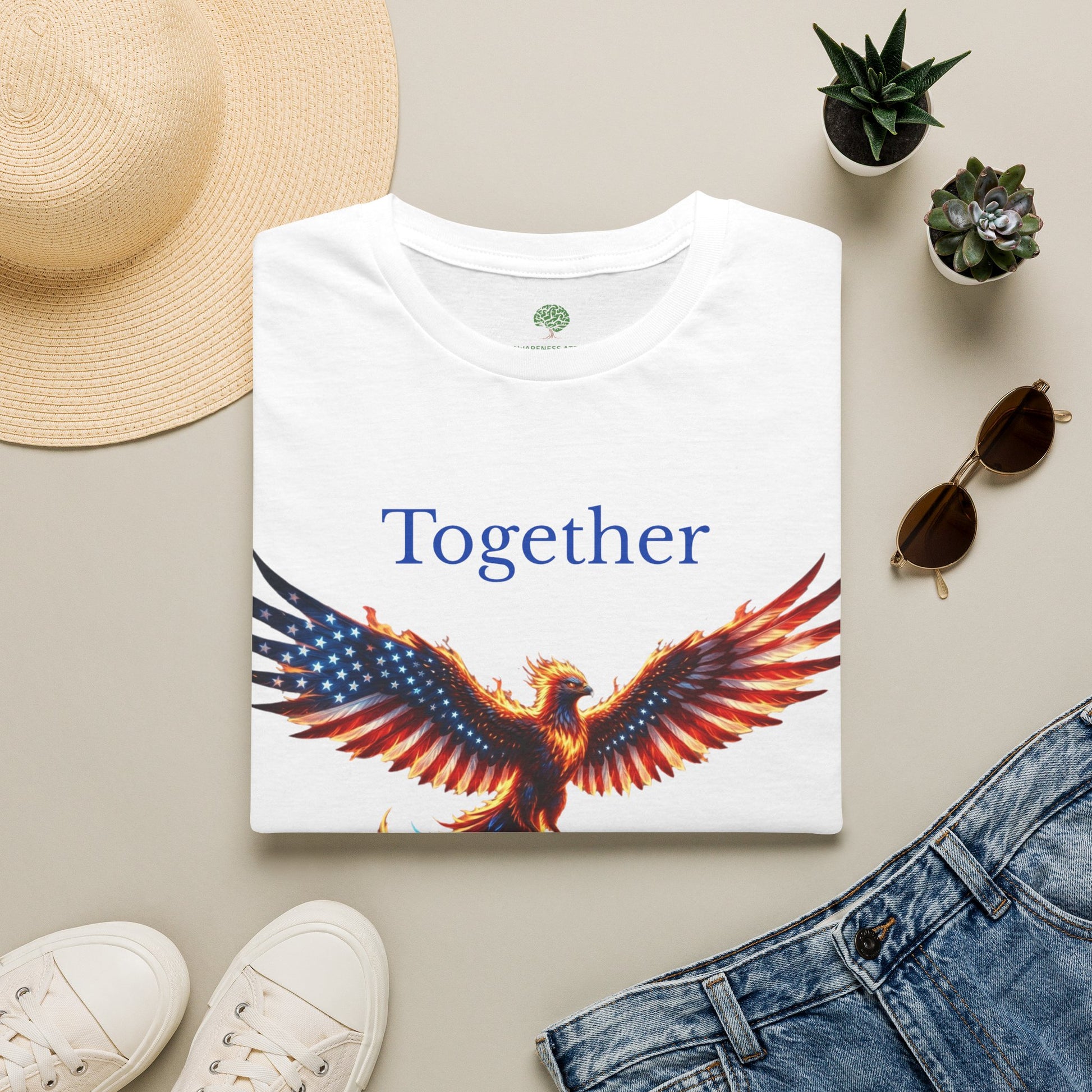 An Awareness Attire tee featuring Ryse the phoenix styled in a red, white, and blue American flag pattern alongside the inspiring slogan 'Together We Will Rise' in white