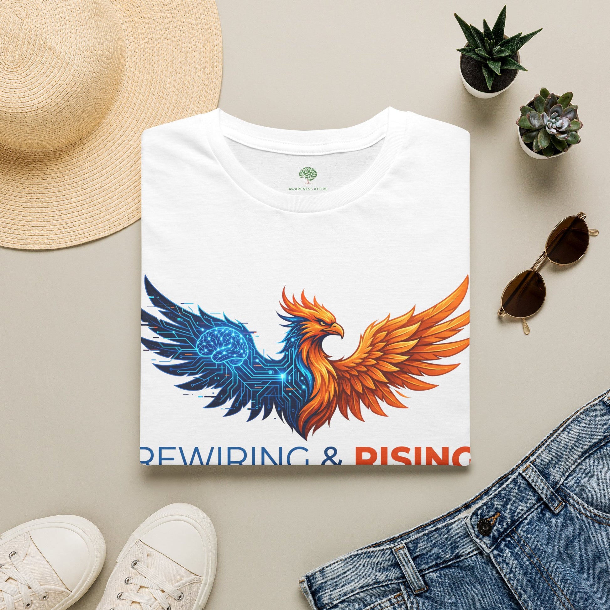 A casual crew-neck shirt designed for FND awareness, showcasing the inspiring message 'Rewiring and Rising' in a modern, easy-to-read typeface in white.